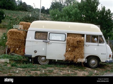 Old Mercedes Benz 206 D Transporter van in France packed with straw ...