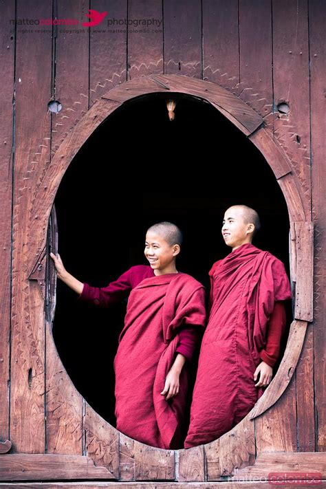 Two Monks Standing In A Oval Window Of A Monastery Myanmar Royalty