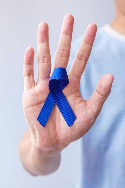 Premium Photo March Colorectal Cancer Awareness Month Woman Holding