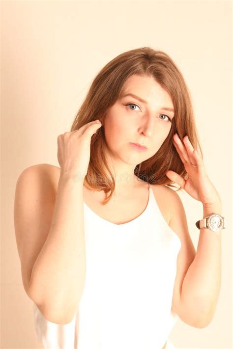 Portrait Of Caucasian Girl With Brown Hair Posing Isolated On White