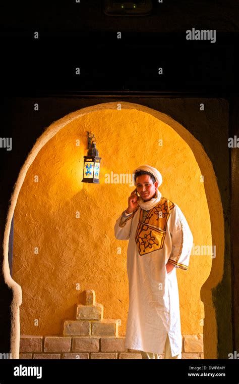 Berber Man In Berber Costume With Mobile Phone Merzouga Morocco