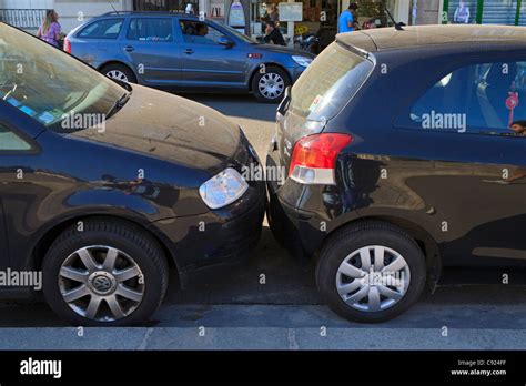 Parking In Paris Cars Are Often Parked So Close They Touch Each Other