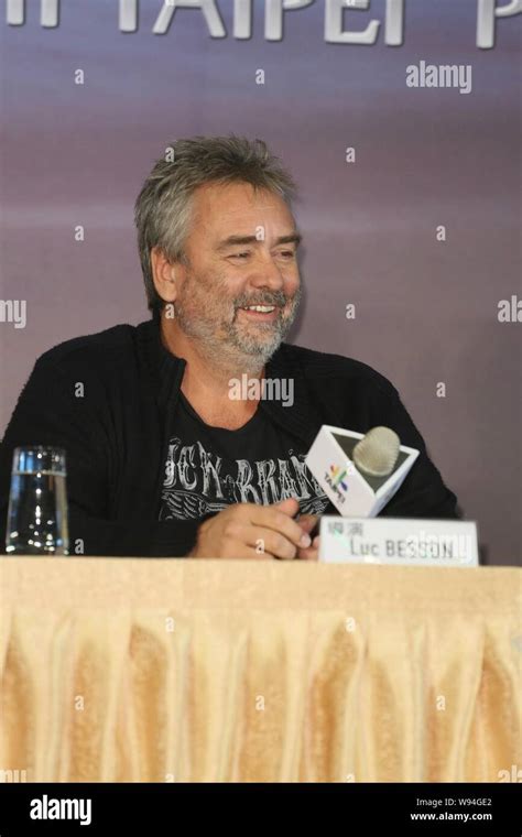 French director Luc Besson smiles during a press conference for his ...