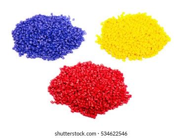 Colourful Plastic Granules On White Background Stock Photo