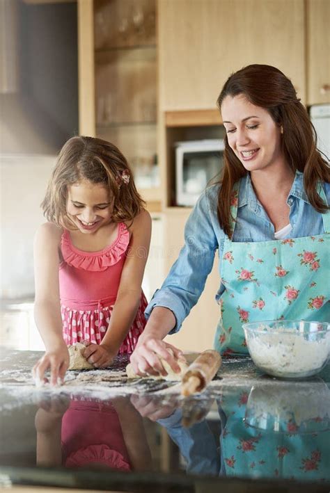 Mother Child And Baking Dough In Kitchen Or Learning Support For