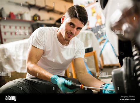 Mechanic Repairing Scooter Hi Res Stock Photography And Images Alamy