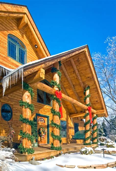 Christmas log cabin porch | Log home decorating, Log homes, Christmas decorations for the home