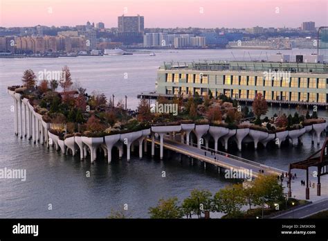 The aerial view of Little Island an artificial island park at pier 55 with Hudson River and New ...