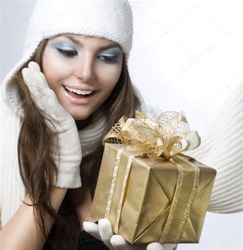 Christmas Gift. Surprised Beautiful Girl Stock Photo by ©Subbotina 10605503