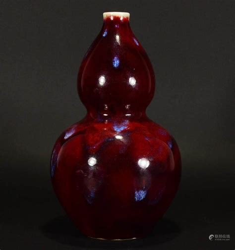 Bidlive A Glazed Gourd Vase