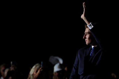 Barron waves and pumps his fist as Trump introduces youngest son to