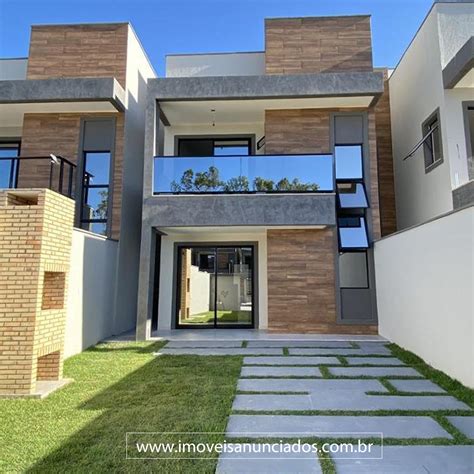 Modern House With Large Windows And Grass