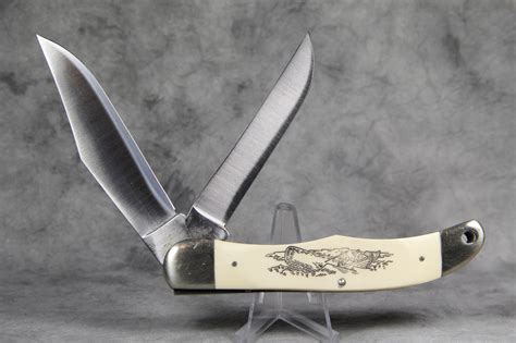 How Much Is SCHRADE SCRIMSHAW 260 SC Folding Hunter Knife Worth