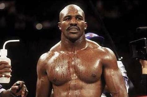 Watch Mike Tysons Greatest Rival Evander Holyfield Gets His Ear