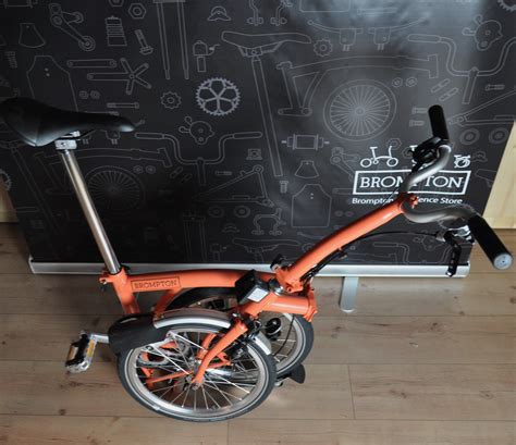 Tums Berlin Faltrad Brompton Fire Coral The Urban Mobility Store