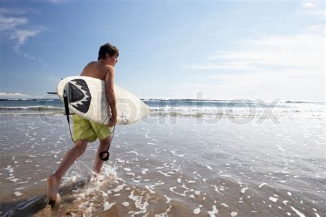 Boys surfing | Stock image | Colourbox