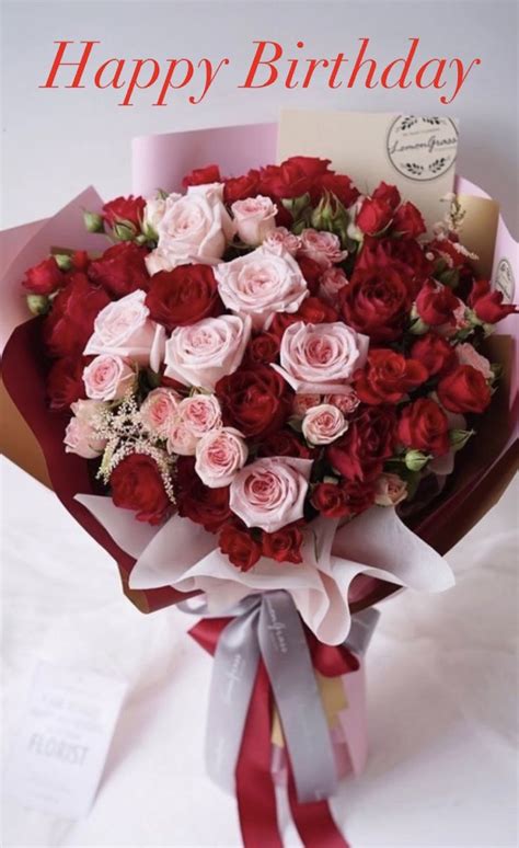 A Bouquet Of Red And Pink Roses On A White Background With The Words