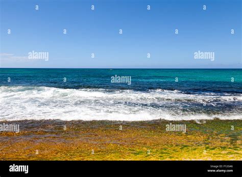 Gentle Ocean Waves Breaking On Shore Stock Photo Alamy