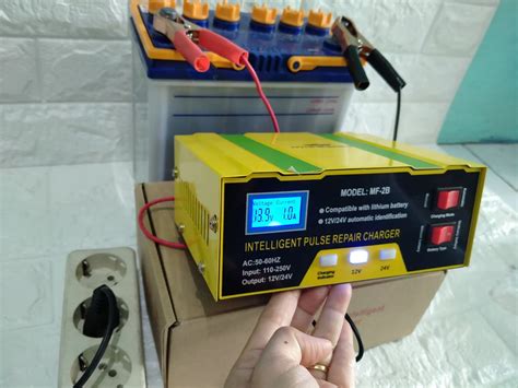 ALAT CHARGER AKI MOTOR MOBIL 10A KUNING REPAIR MODE 12V 24V OTOMATIS