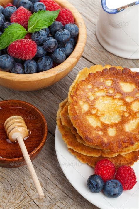 Pancakes With Raspberry Blueberry Mint And Honey Syrup Breakfast Cake Blueberry Breakfast