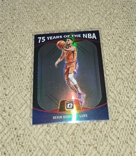 2021 22 DEVIN BOOKER DONRUSS OPTIC 75 YEARS OF THE NBA PRIZM INSERT 29