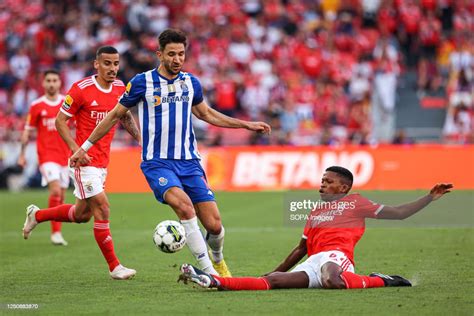 Marko Grujic Of Fc Porto And Florentino Luis Of Sl Benfica In Action