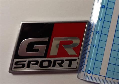 toyota genuine harrier gr sport  door  plate emblem