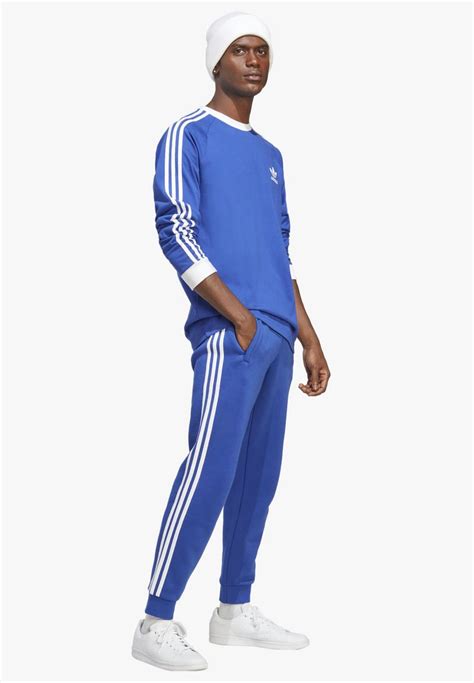 Adidas Originals Stripes Pant Unisex Tracksuit Bottoms Semi Lucid Blueroyal Blue Zalando