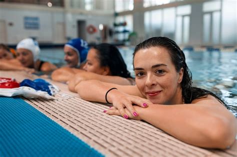 Free Photo | Water polo players at the pool with swimming equipment