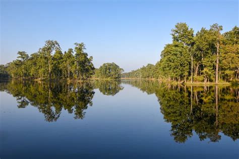 Beautiful Quiet Lake In Chitwan National Park On Nepal Stock Photo