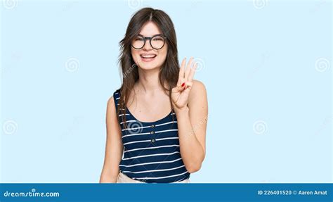 Young Beautiful Caucasian Girl Wearing Casual Clothes And Glasses