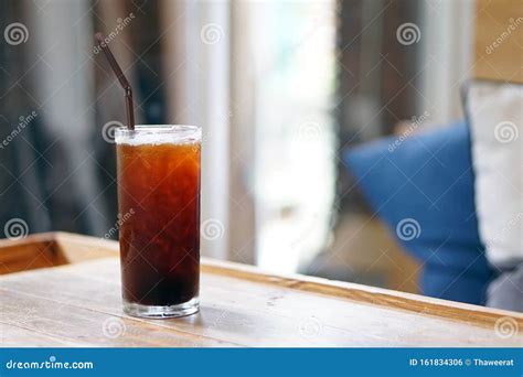 Iced Americano A Glass Of Black Coffee On Table And Copy Space The