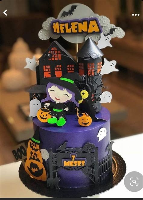 There Is A Cake That Has Been Decorated For Halloween