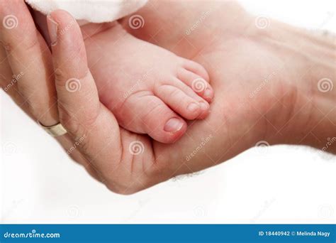 Baby Leg In Father S Hand Picture Image 18440942