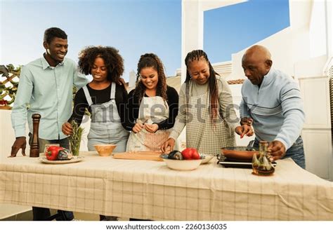 Happy African Family Cooking Together Outdoor Stock Photo 2260136035 ...