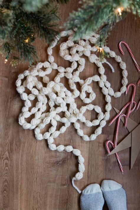 How To Finger Knit Pretty Soft And Affordable Holiday Garland And