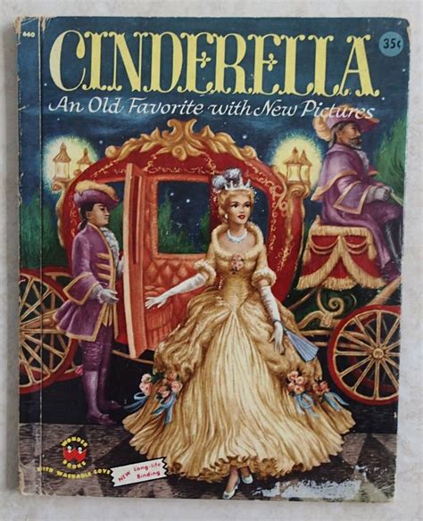 the front cover of cinderella an old favorite with new pictures, written in english and spanish