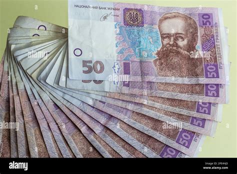 Ukrainian Paper Money Is Laid Out On A Blue Background 50 Hryvnia