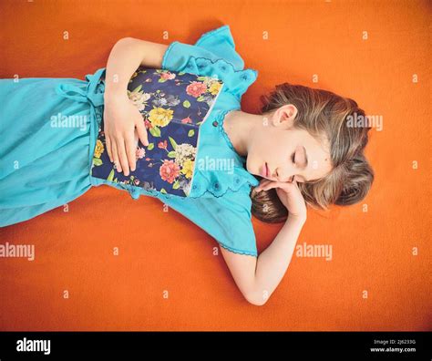 Girl Sleeping With Book Hi Res Stock Photography And Images Alamy