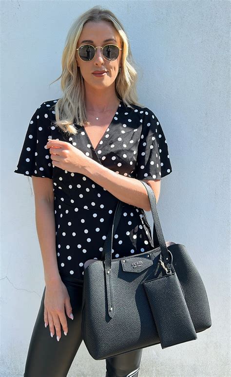 Camille Black And White Polka Dot Wrap Peplum — Therapy Boutique Womens