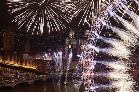 Fireworks explode over The London Eye and Elizabeth Tower near ...