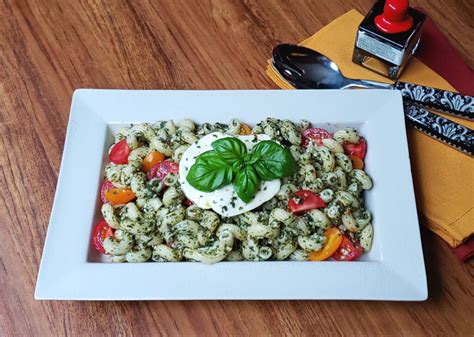 Delicious Caprese Pesto Pasta Salad By Mostly Bakes