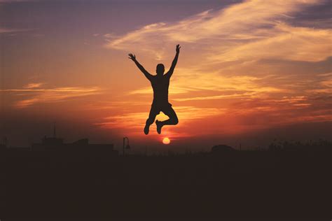 Silhouette Of Man Jumping During Golden Hour HD Wallpaper Wallpaper Flare