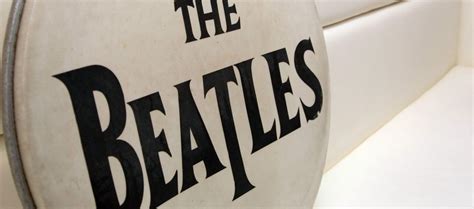 The Interesting History Behind The Beatles Logo