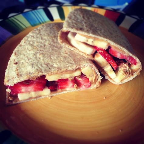 Honey Peanut Butter On Multigrain Tortilla With Strawberry And Banana Slices And Gluten Free