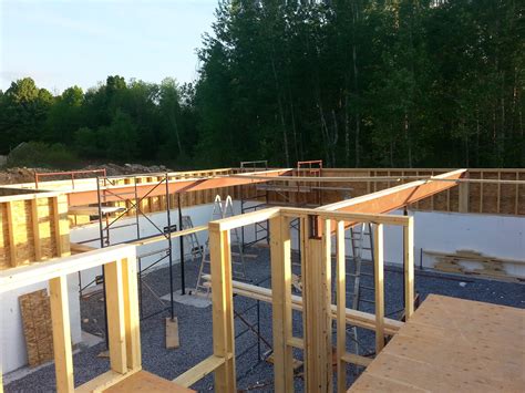 Week 5: Installing steel beams & floor joists in a new home