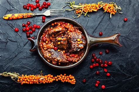 Pieces Of Beef Stewed In Sea Buckthorn And Cranberries Tasty Meat