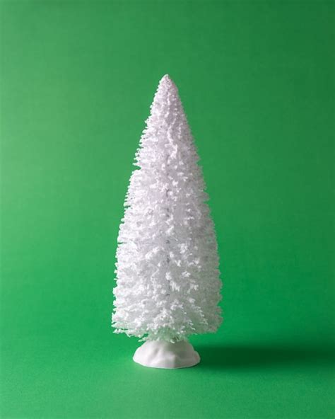 Premium Photo | Snowy christmas tree