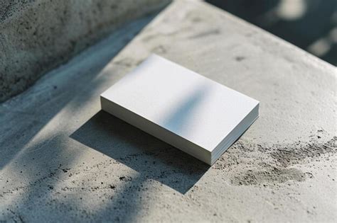 Premium Photo A White Box Sitting On Top Of A Cement Floor