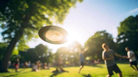 Group Of People Playing Frisbee In The Park Stock Photo Creative Fabrica